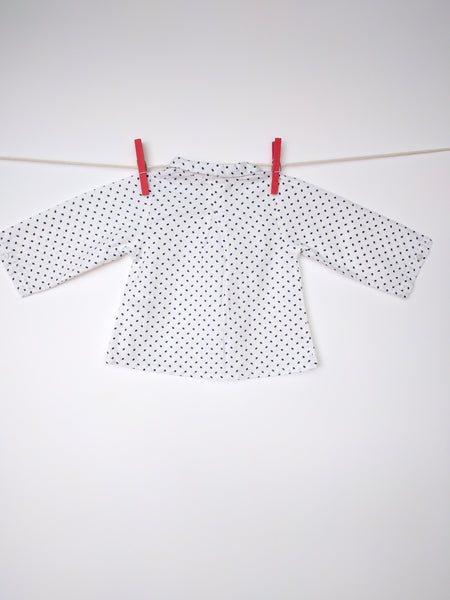 Chemise à pois bleu et blanc