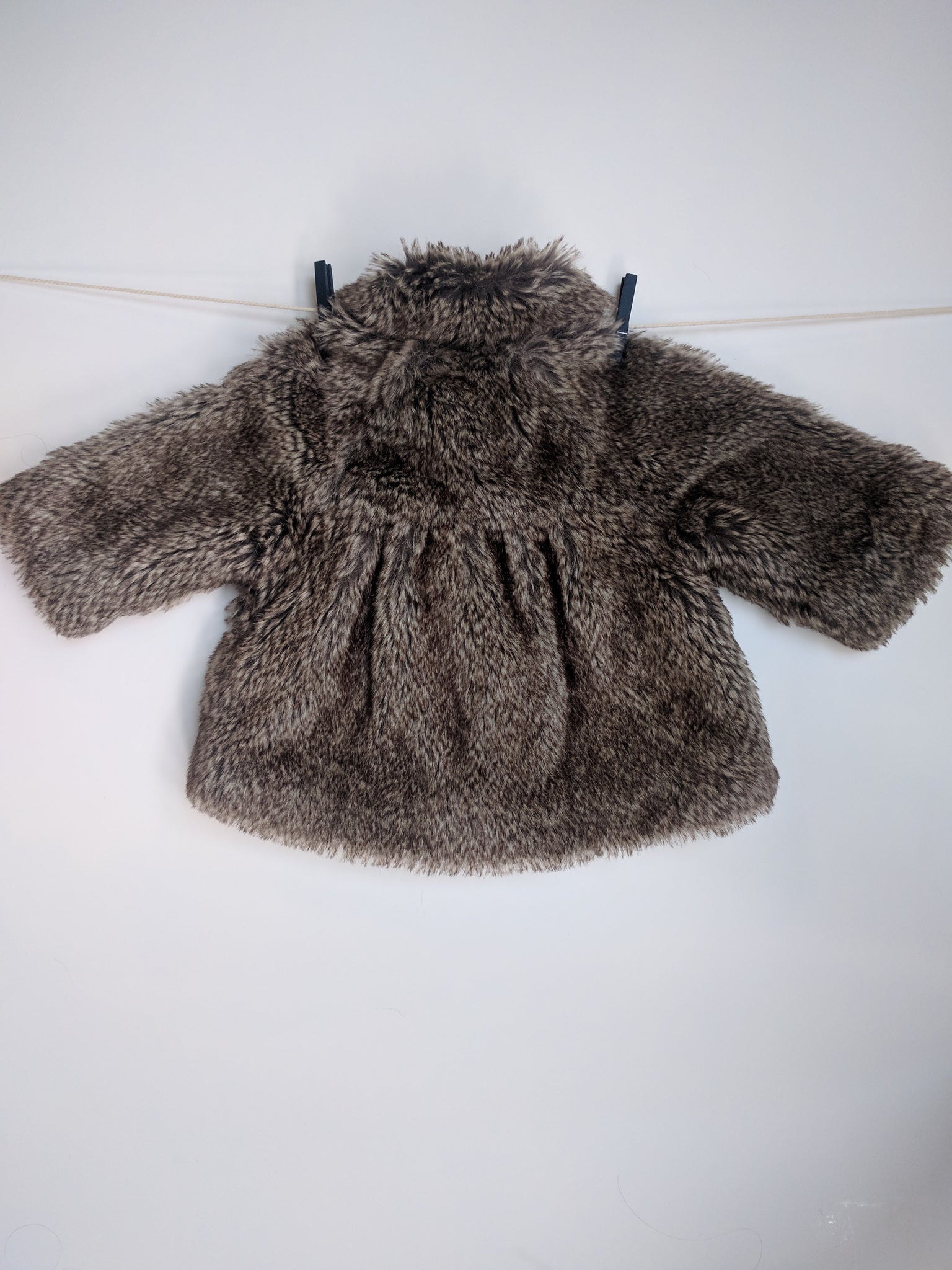 Manteau fausse fourrure