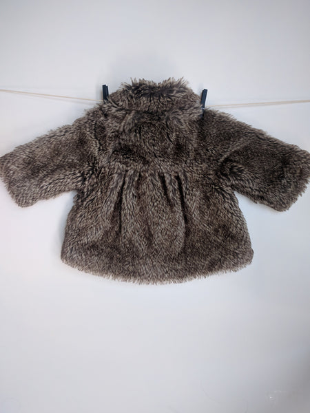 Manteau fausse fourrure