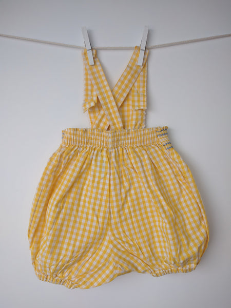 Salopette à carreaux jaune et blanche