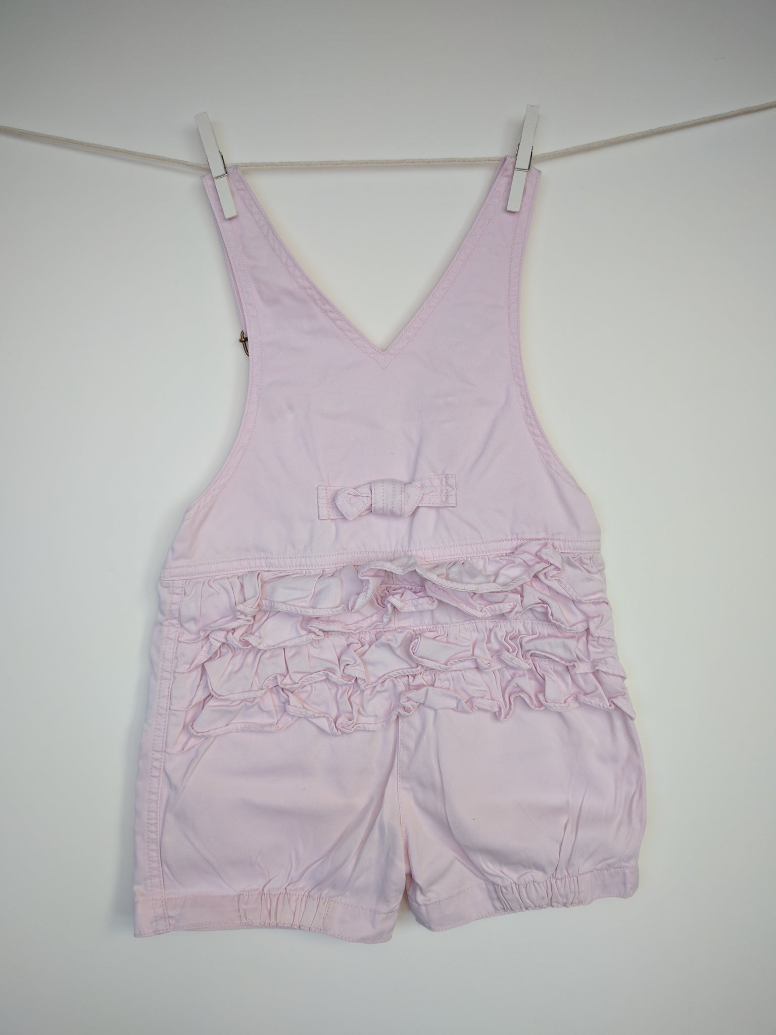 Salopette rose pâle