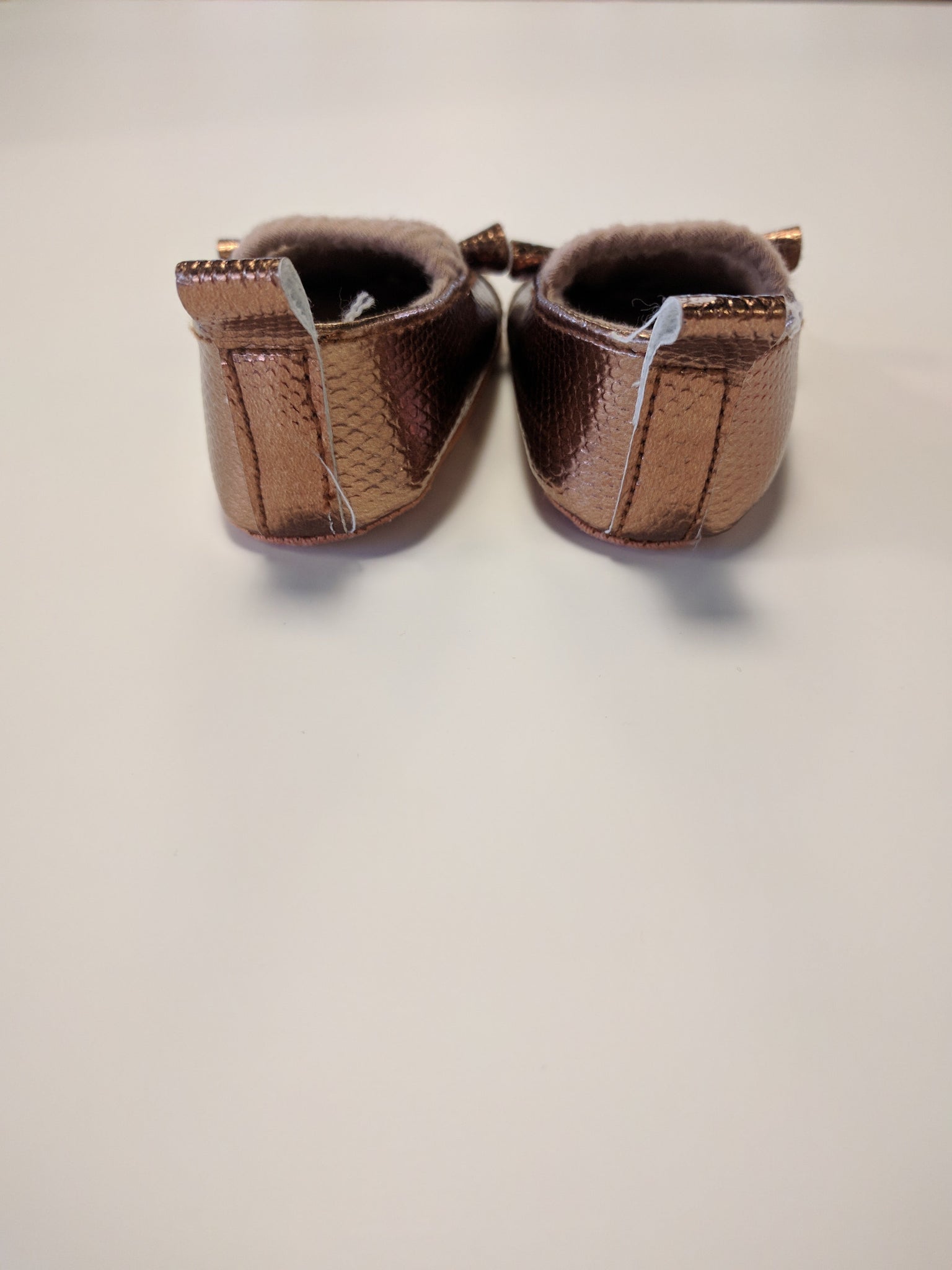 Chaussure dorée petite souris