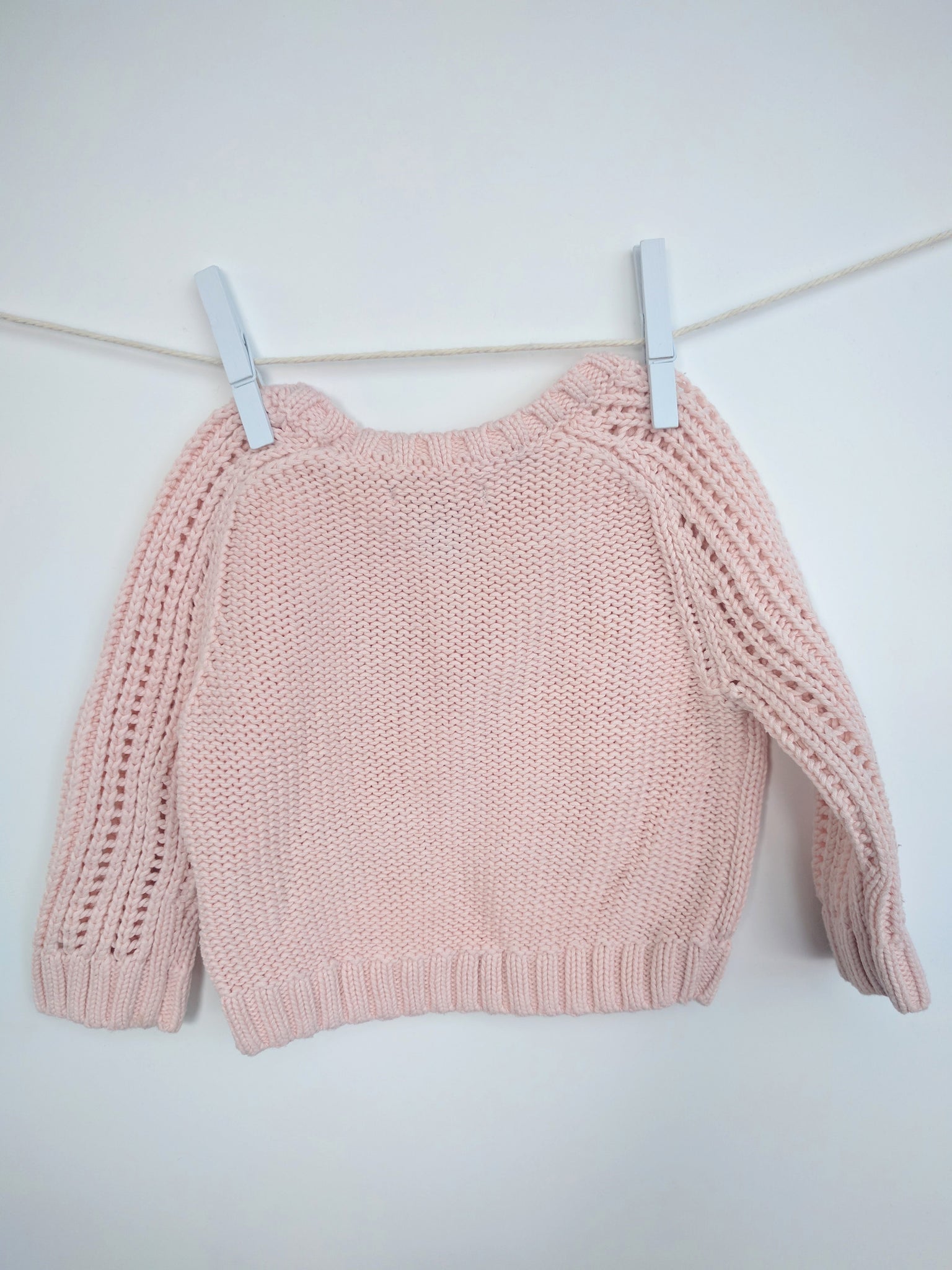 Pull tricoté pastel