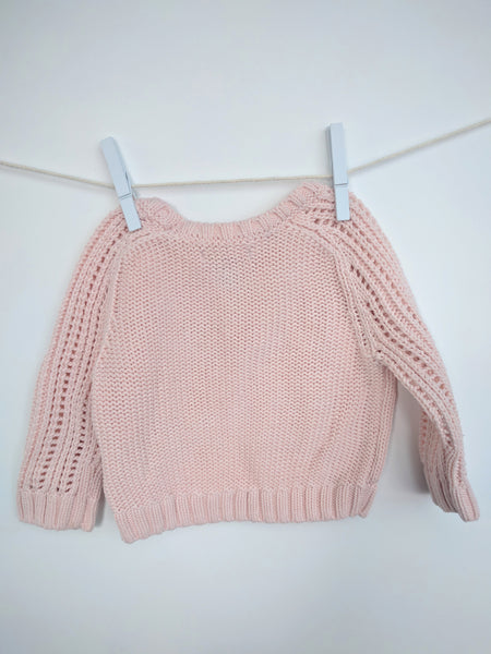 Pull tricoté pastel