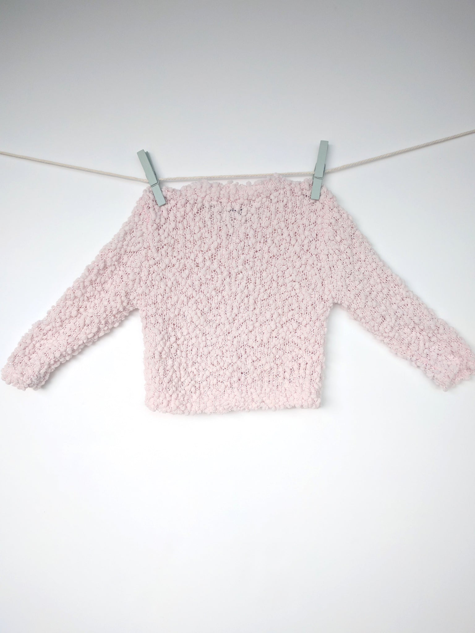 Gilet en point mousse rose